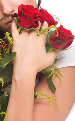 Closeup portrait of attractive young woman holding a red rose