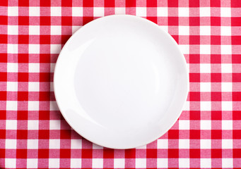 Plate on a tablecloth