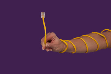 Female hand with coiled ethernet cable