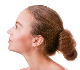 Naklejka premium Young woman face on white