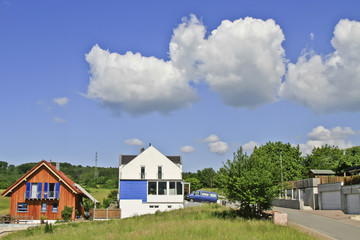 Obraz premium Wolken über Eigenheim