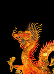 Chinese style dragon statue isolated on black background.