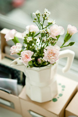 White and pink Carnation in moka pot
