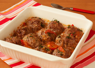 meatballs with vegetables in white pan