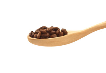 Wooden spoon with coffee beans side view