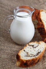 Glass jug with milk
