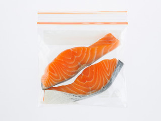 Salmon in storage safety zipper bag isolated