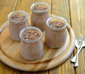 Chocolate Panna Cotta on a brown table