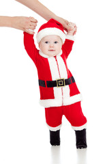 first steps of funny Santa claus baby