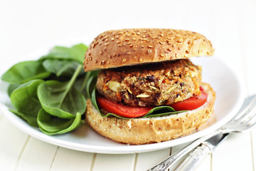 Vegan burger with spinach (made with beans and vegetables)