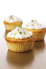 Cupcakes with coconut and lime frosting