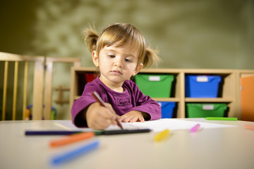 Fototapeta premium Babies and fun, child drawing at school