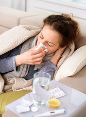 Sick Woman. Flu. Woman Caught Cold. Sneezing into Tissue - obrazy, fototapety, plakaty