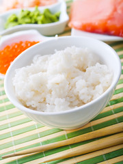 ingredients for sushi, sakmon and cucumber