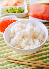 ingredients for sushi, sakmon and cucumber