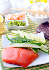 ingredients for sushi, sakmon and cucumber