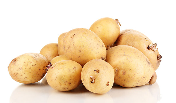 Ripe potatoes isolated on white