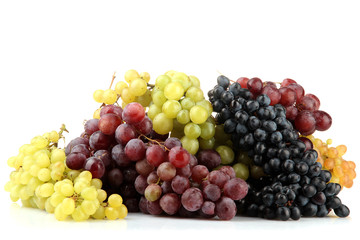 assortment of ripe sweet grapes isolated on white.