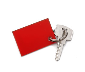 key with a tag on a white background