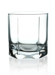 Crystal empty glass to whiskey. On a white background.