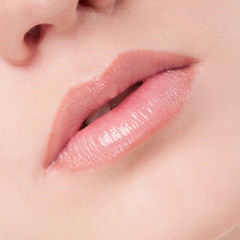 Fototapeta premium Face of beauty young woman. Lips zone