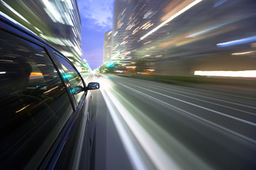 Fototapeta na wymiar Night drive with car in motion.