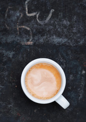 Frothy cup of freshly brewed cappuccino