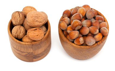 hazelnut and walnut in a wooden bowls