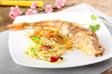 Pasta with a sauce of fresh fish