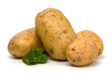 Potatoes and parsley isolated on white background