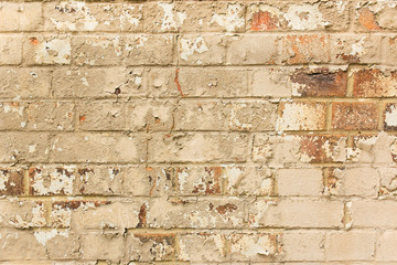 Aged crumbling brick wall texture background