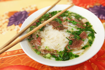 Traditional Vietnamese soup Pho with rice noodles and meat