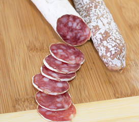 Culinary traditional spanish sausages on wooden background.