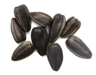 black seeds on a white background. macro
