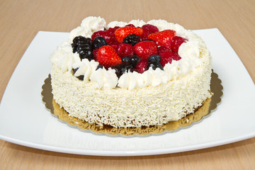 White Cream Icing Cake with Fruits