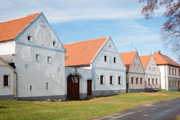 Fototapeta na wymiar Rural decorated houses in Holasovice, Czech republic, UNESCO