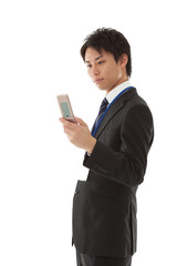 Young businessman working with mobile phone