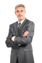 Smiling handsome businessman. Isolated over white background