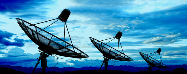 satellite dish antennas under blue sky