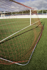 Red goal on grass