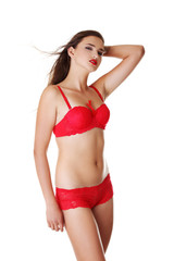 Obraz premium Young woman posing in lingerie