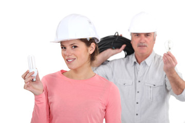 Electrician with eco light bulbs