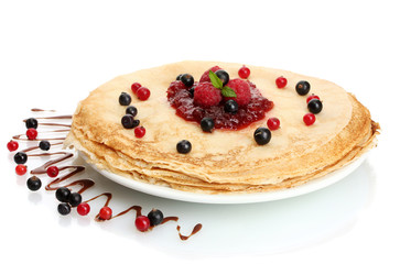 Delicious pancakes with berries and jam