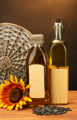 oil in bottles, sunflower and seeds,