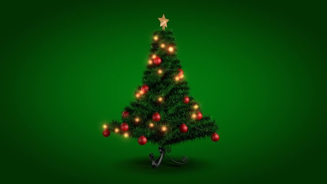 Rotating Christmas tree over green background