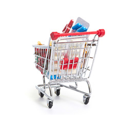 Fototapeta premium Shopping trolley with pills and medicine