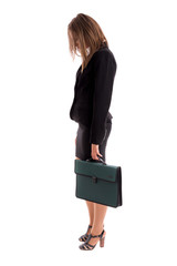 Overworked business woman carring her briefcase