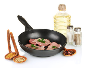composition of raw meat and spices on white background close-up