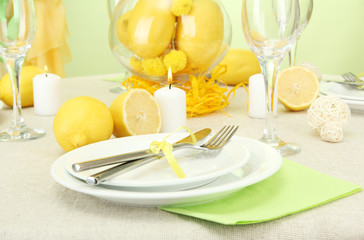 beautiful holiday table setting with lemons, close up