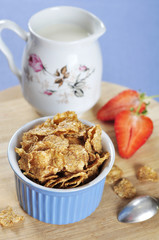 bran flakes cereal in blue bowl